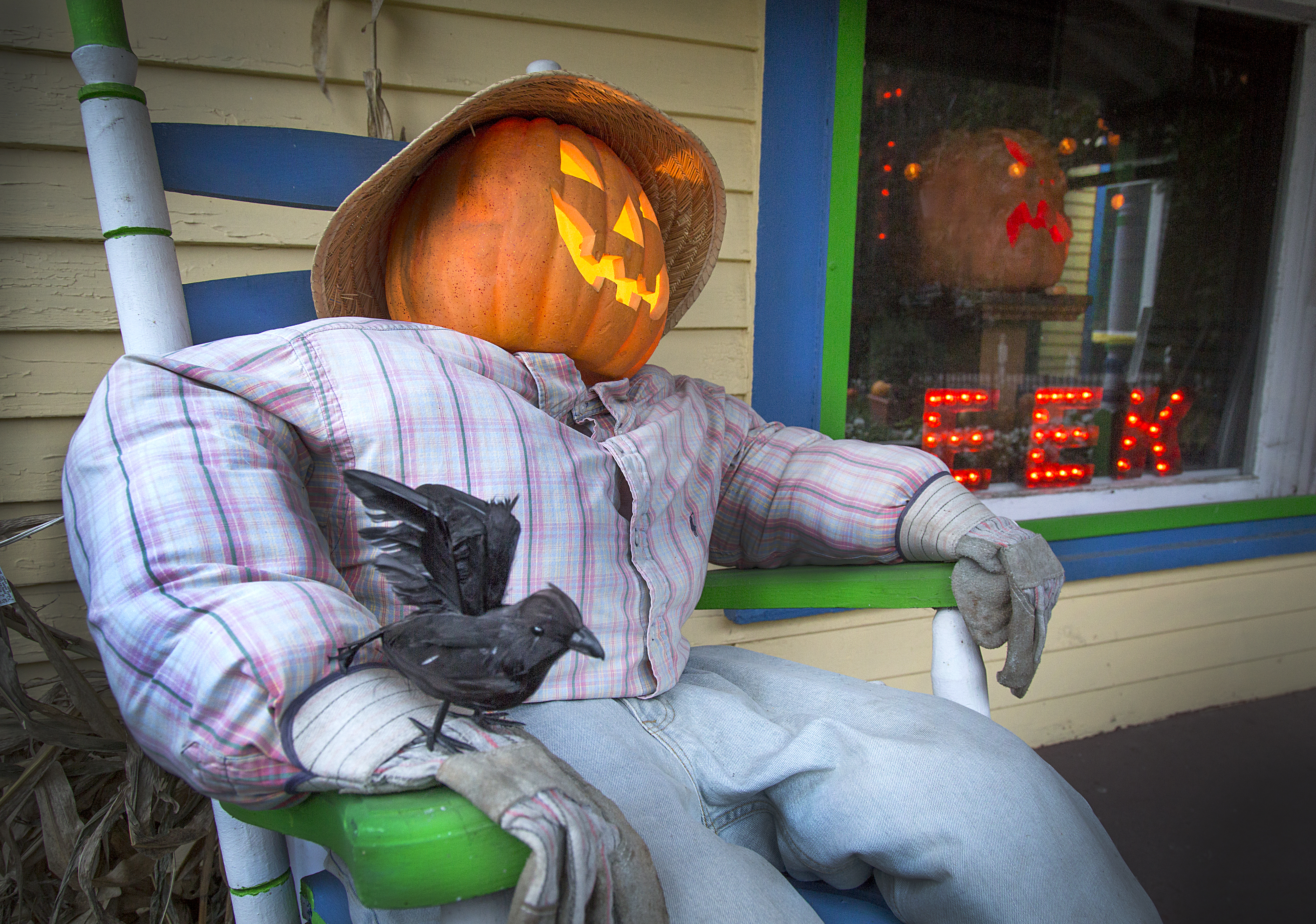 headless horseman Halloween decoration on porch